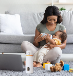 RESIGILAT - Incalzitor Portabil pentru Biberoane Kindy, Fara Fir, Control al Temperaturii