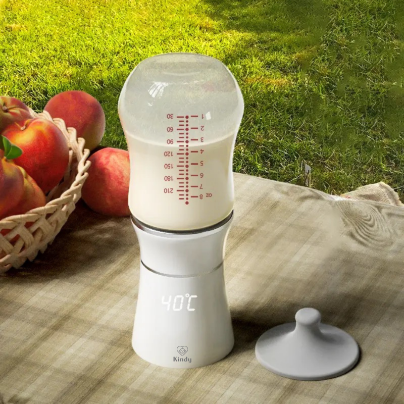 RESIGILAT Incalzitor biberon portabil Kindy, fara fir, electric, adaptoare pentru biberoane, USB, Alb